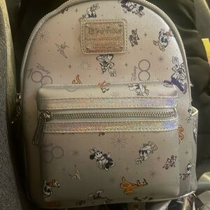 Brand New 100th anniversary platinum limited edition Loungefly backpack